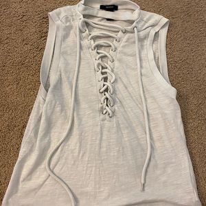 Adjustable sizing around breasts white top